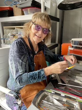 Artist Nancy Traviss in her studio